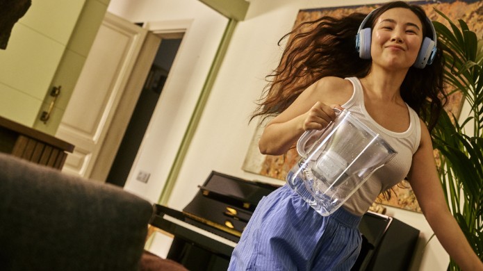 Woman dancing with headphones
