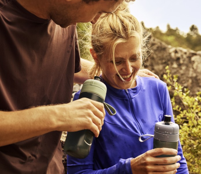 Smiling hikers resting